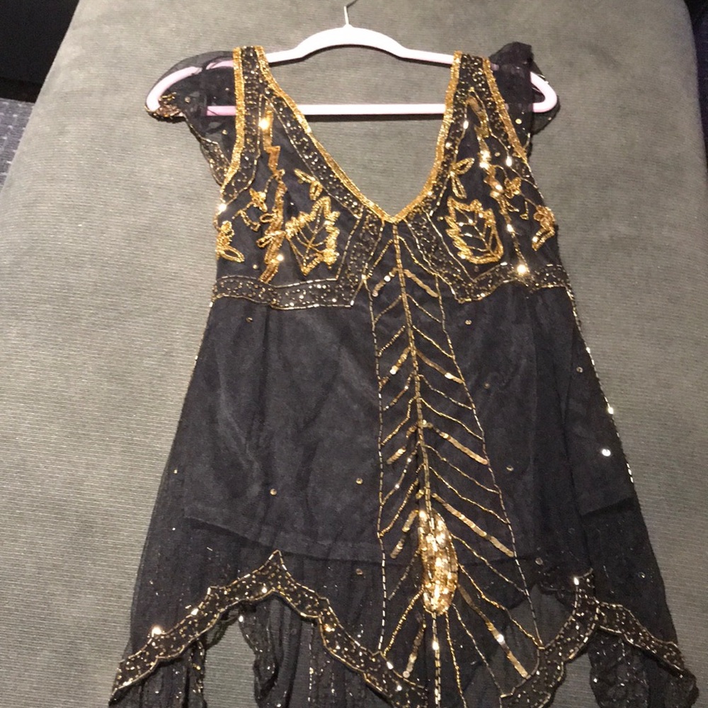 Black top with gold beading